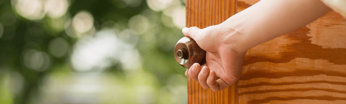 Fine Finisher sanding a solid wood door