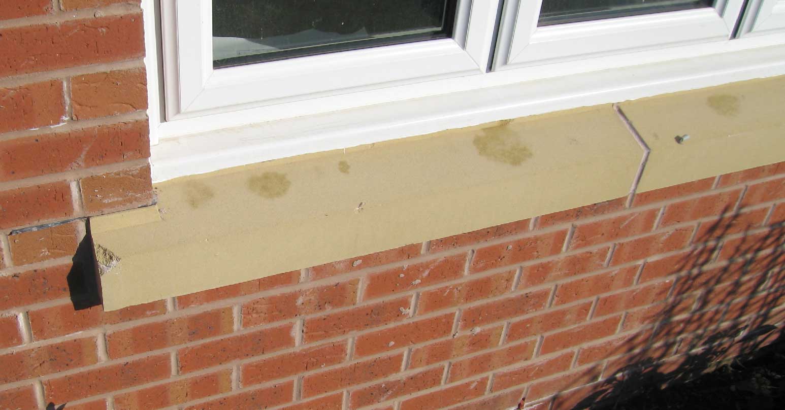 Stained stone cill - Before repair