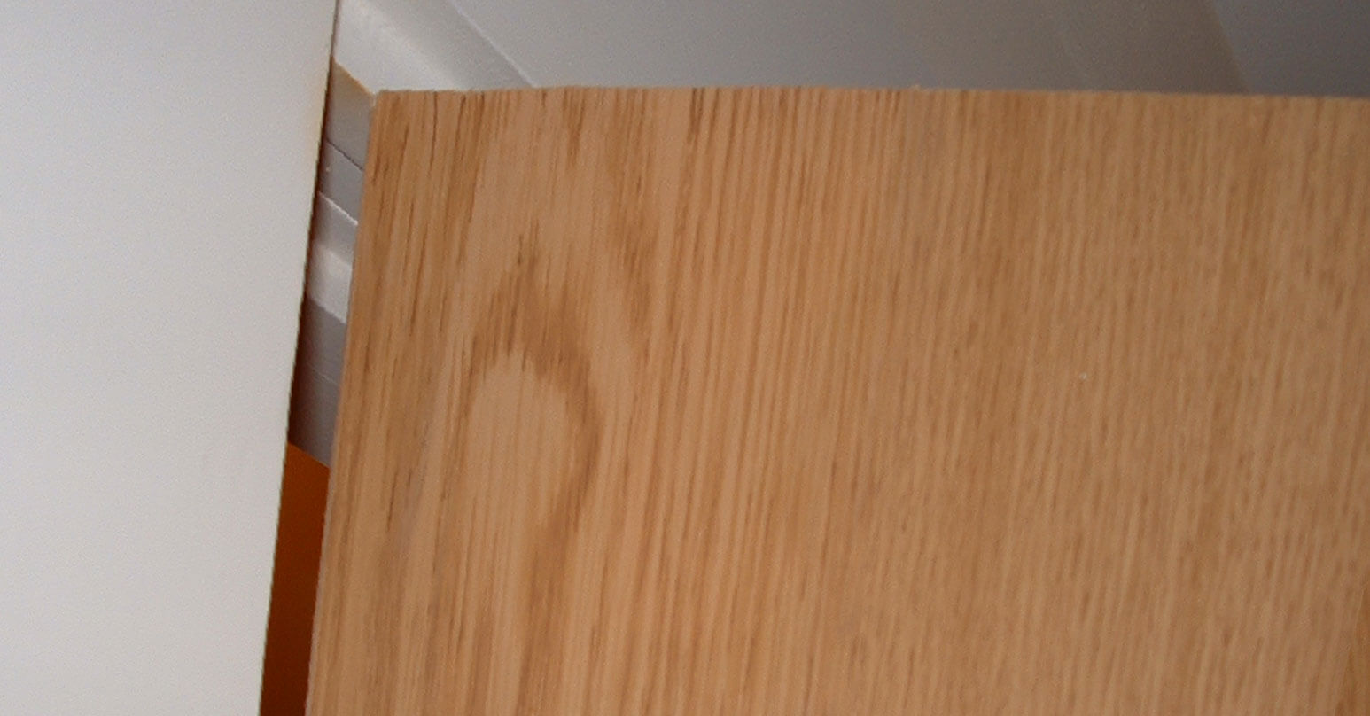 Badly chipped laminate door - After repair