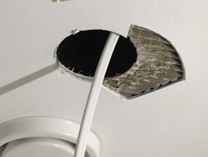 Hole in ceiling for light