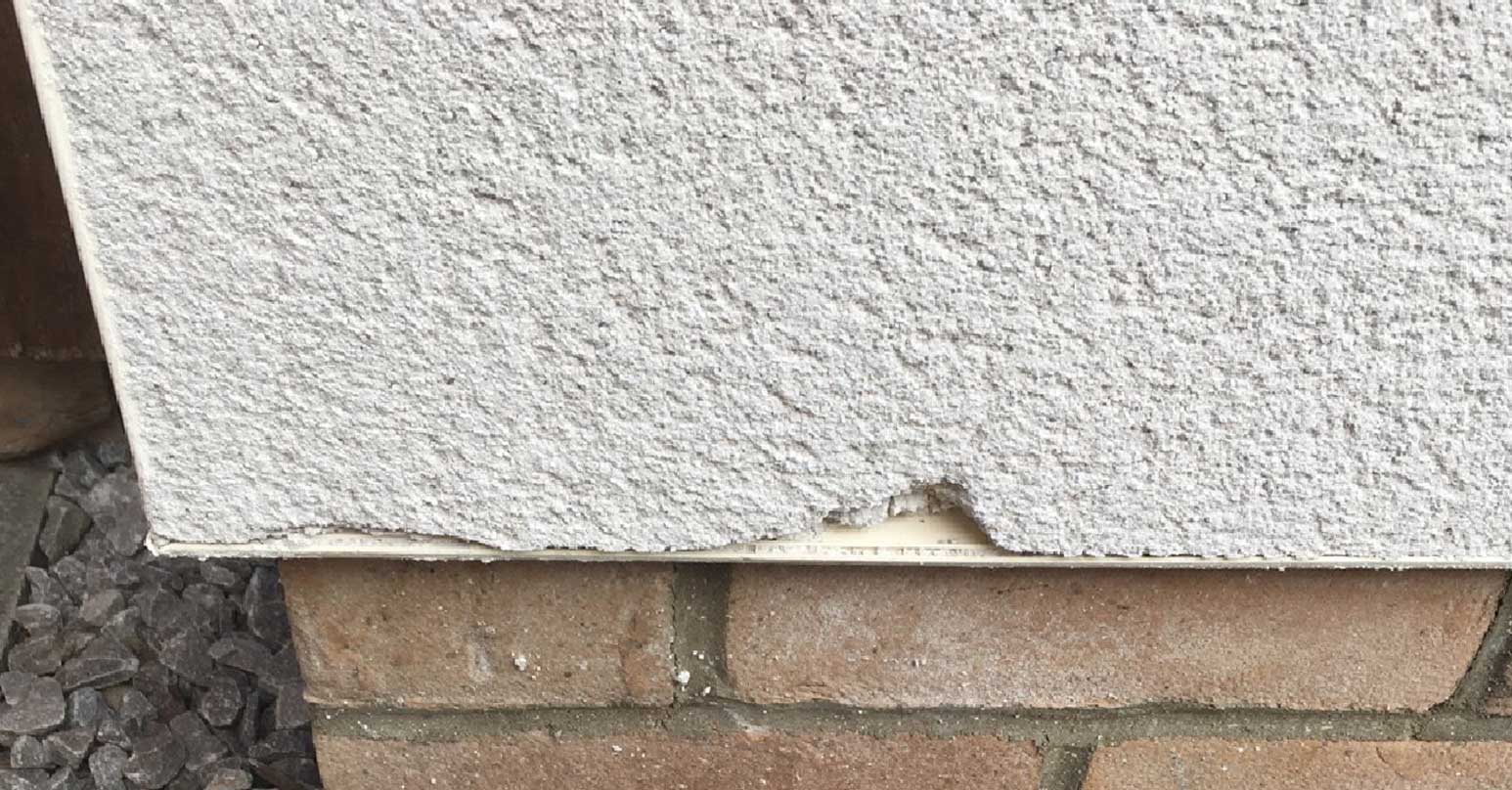 Chipped render wall - Before repair