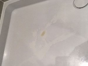 Repair to cracked shower tray