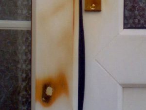 Burnt uPVC door frame