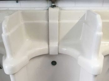 Restored antique urinal