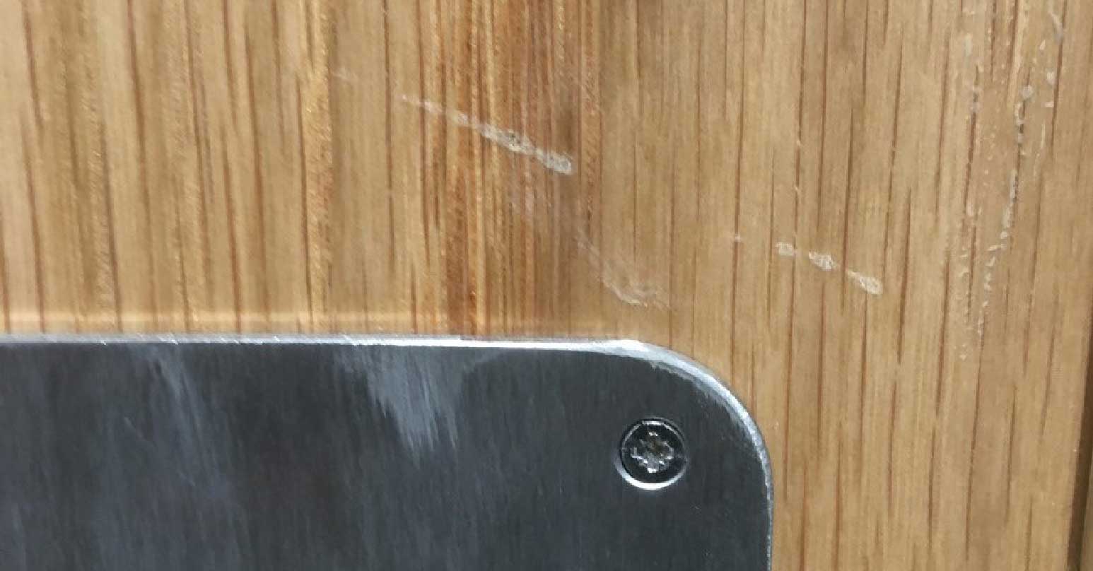 Scratched wood door - Before repair