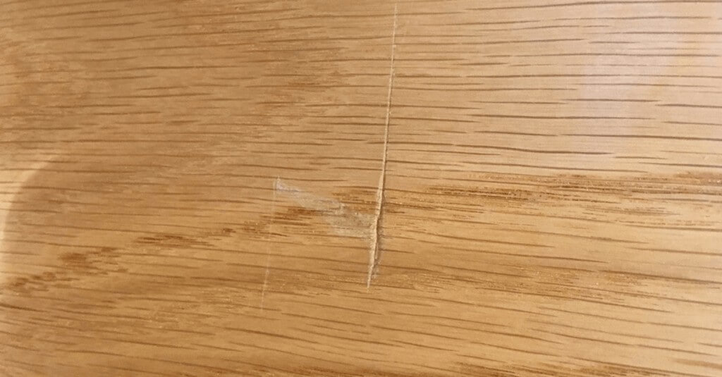 Scratched wood - Before repair